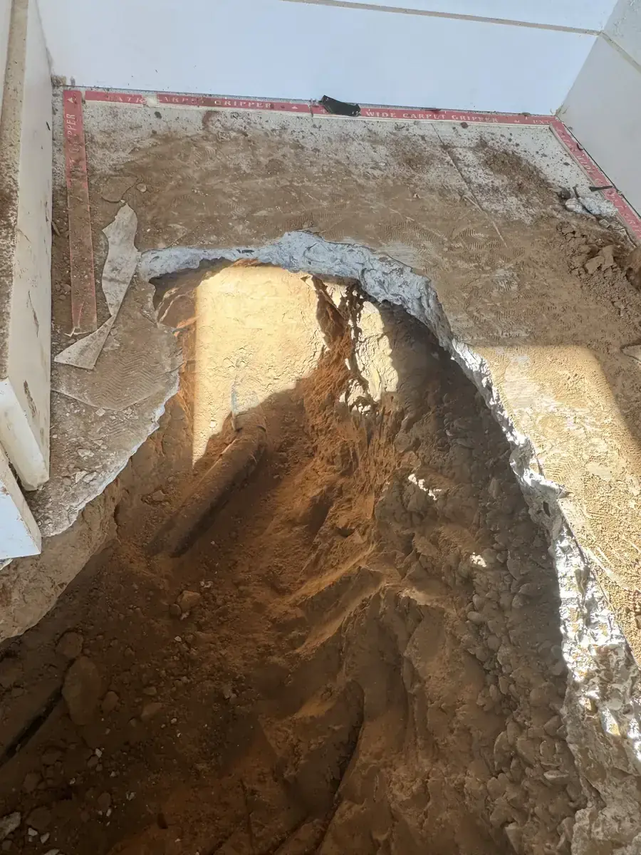 Before: slab cut open to reach a leaking copper line under a Phoenix home